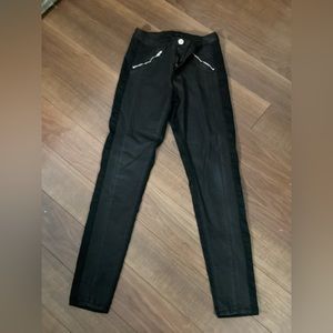 Black tape denim and pleather jeans